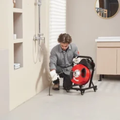 VEVOR Drain Cleaner Machine 50FT X 1/2 Inch, Manual Feed Sewer Snake Auger - With Wheels, 4 Cutters & Air-activated Foot Switch, Red