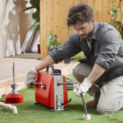 VEVOR 66FT X 5/8 Inch Drain Cleaner Machine, 250W Electric Sewer Snake Auger Manual Feed - With 7 Cutters, 2 Steel Cables, Red